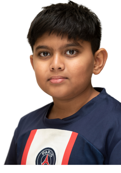 Young achiever student portfolio. Portrait of Jaden Dsouza, student of Dubai Scholar School, wearing a PSG t-shirt. Jaden Dsouza – Trinity College Dubai student recognized for academic excellence and communication skills in Year 7 STEM program.